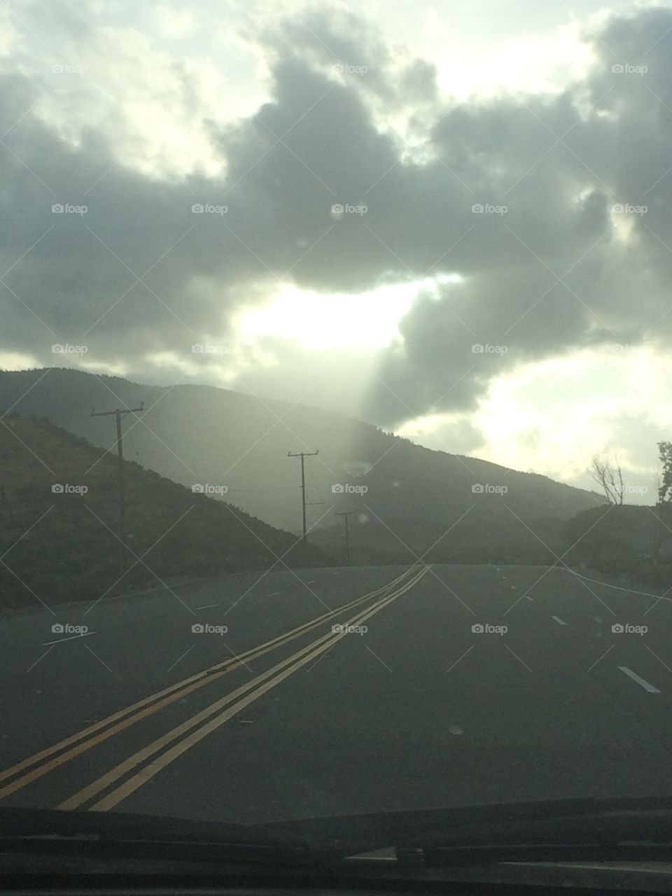 Sun coming through clouds