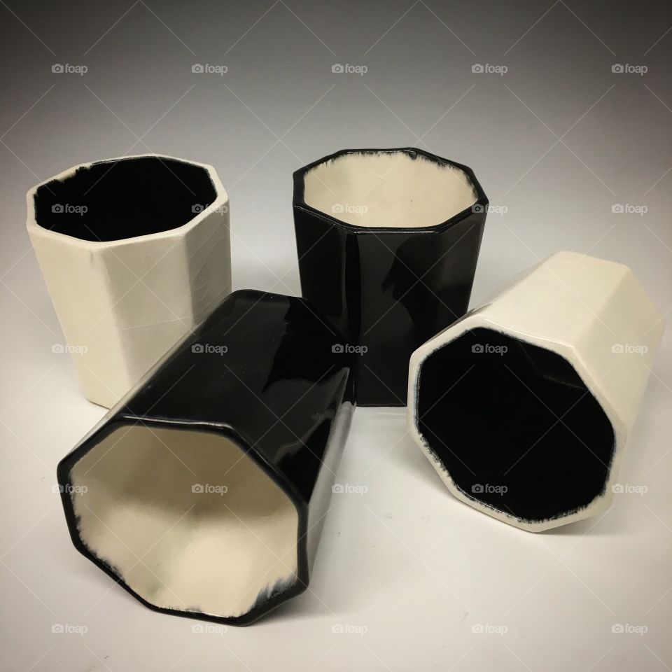 4 minimal, black and white cups. Mismatched with care.