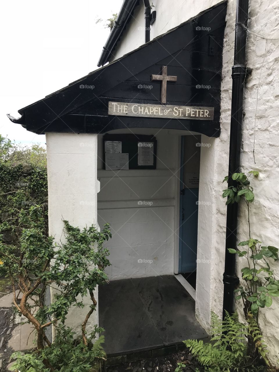 Entrance to the tiny but equally important church of St Peter, set in the heart of the cobbled in Clovelly village.