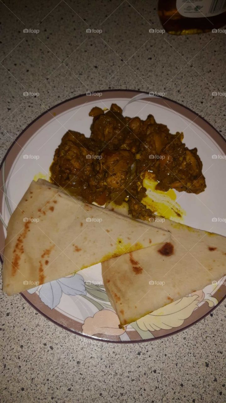 Curried chicken and roti