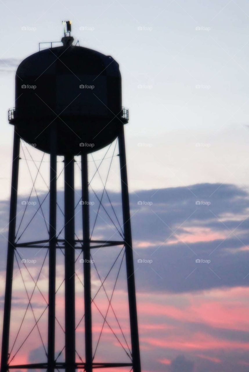 sunset water tower silhouette