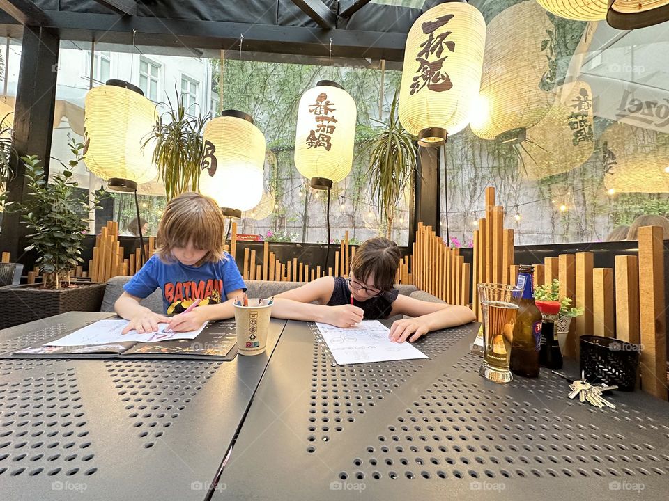 Kids playing in restaurant 