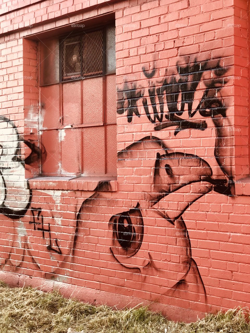 The street art decorating an abandoned warehouse on San Pablo ave in Oakland California.