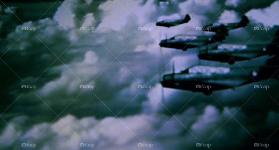 The image of the plane in the sky during the second world war, a row of fighter planes will attack