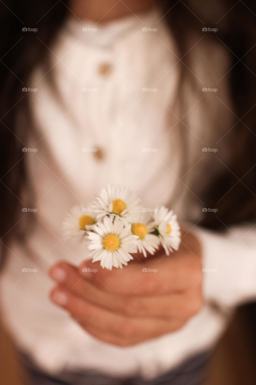Holding flowers 