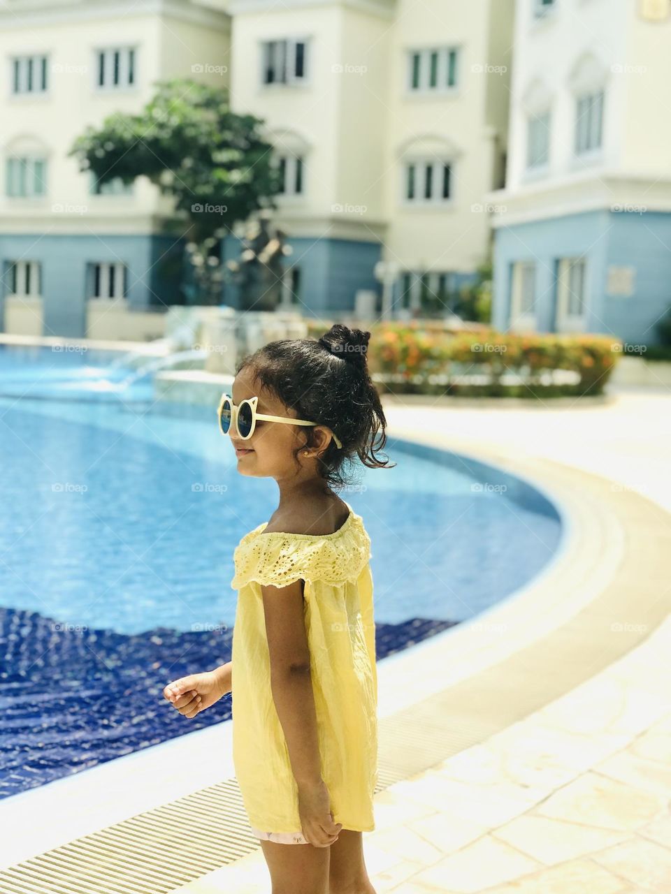 It’s summertime so baby girl enjoying summer at swimming pool 