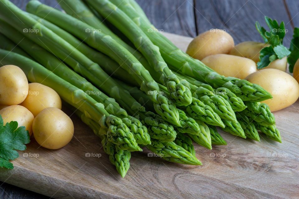 fresh green asparagus and potatoes