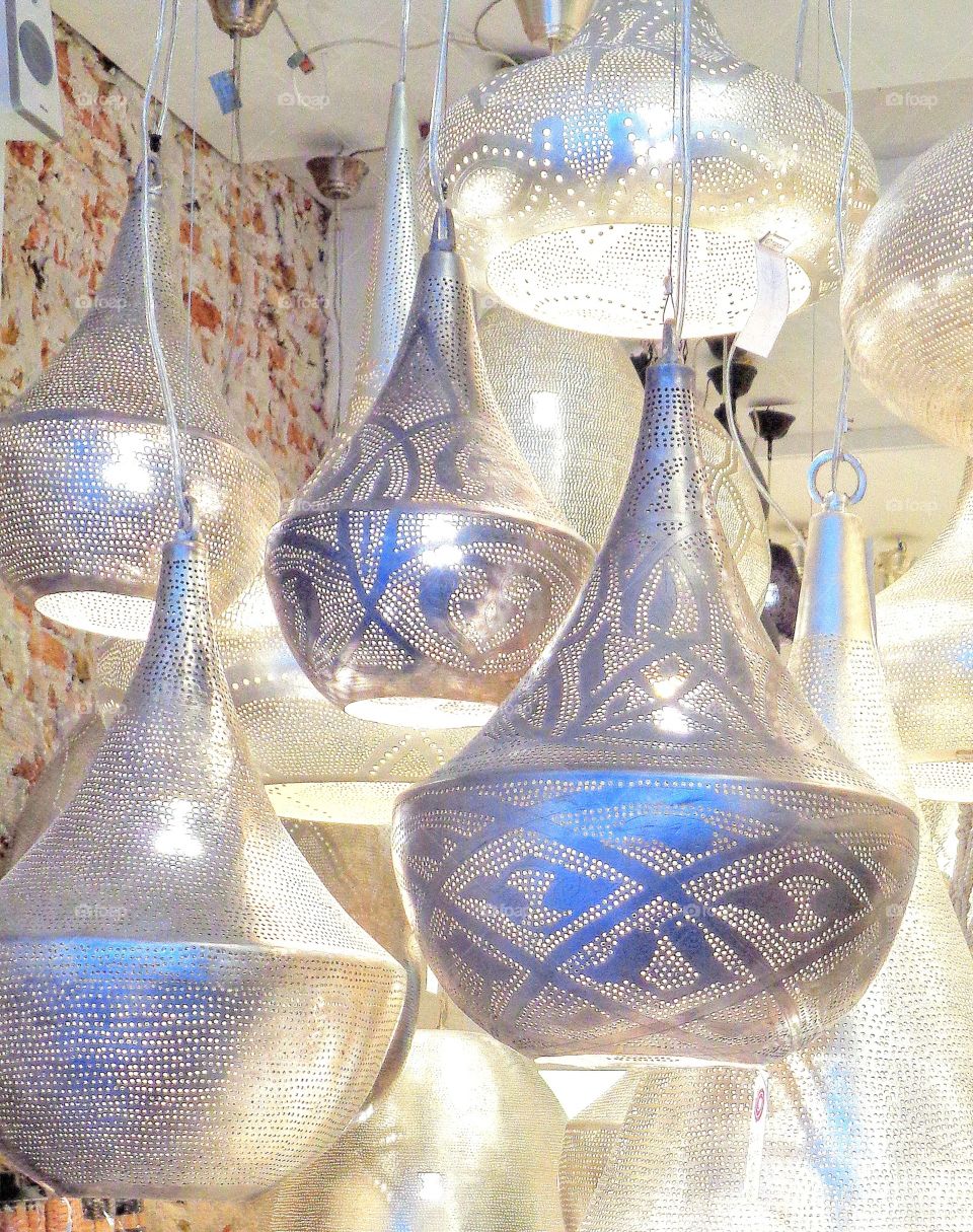 Beautiful display of handcrafted pendant lamps — contemporary interpretations of ancient Egyptian lighting.