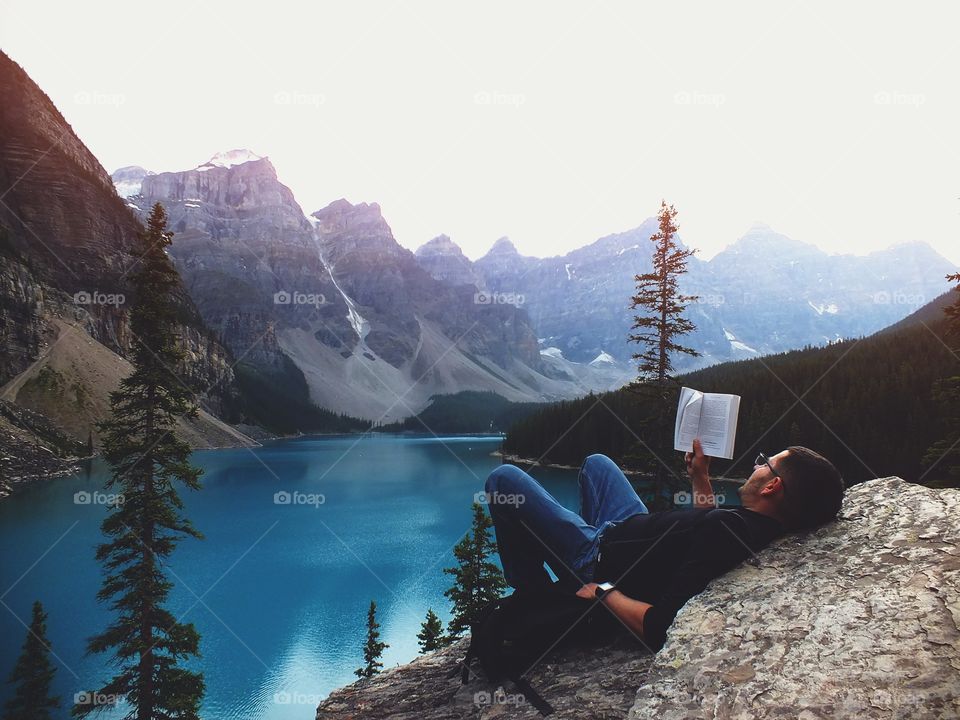 Man Reading in the pinnacle of nature Pt. 2
Beautiful scenic Mountains and lake 