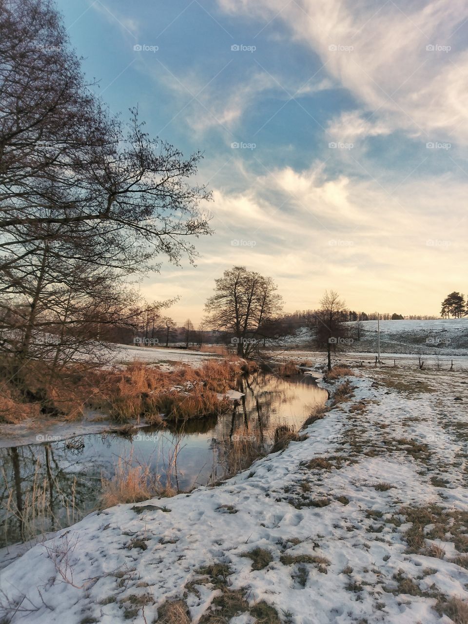 Scenic view of river during winter