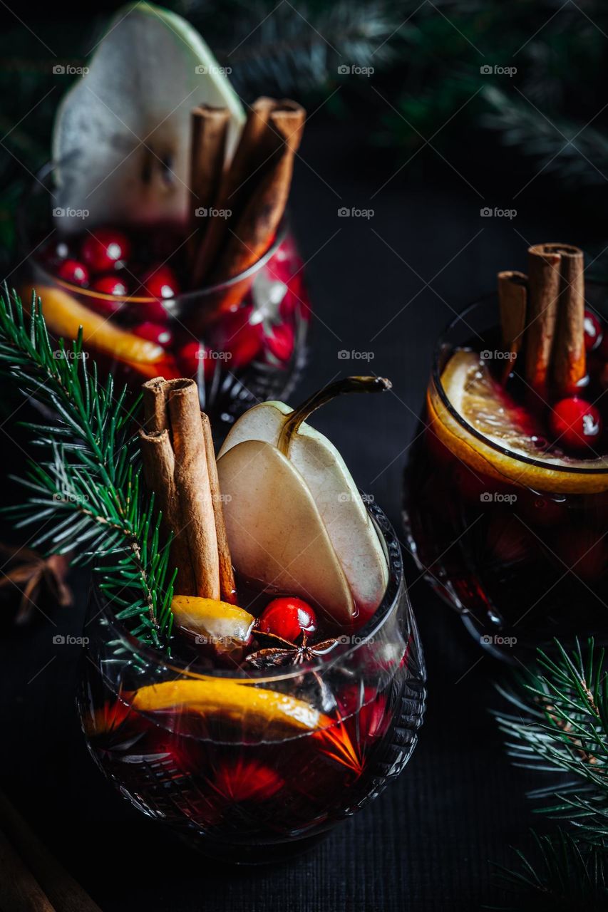 winter festive hot wine in a dark surrounding