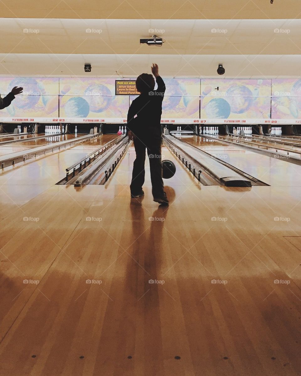 Little Boy Bowling
