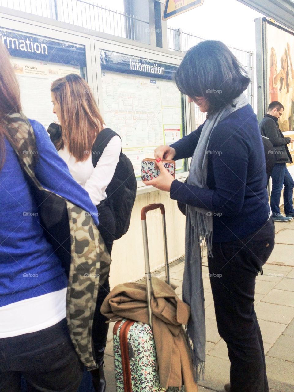 Woman buying a ticket