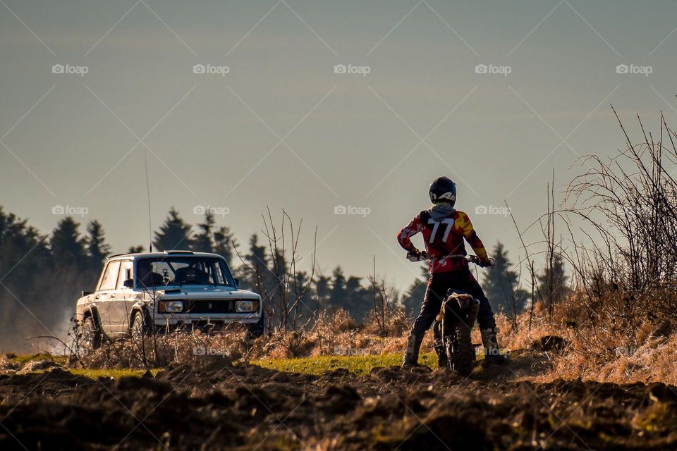 A rider and a car