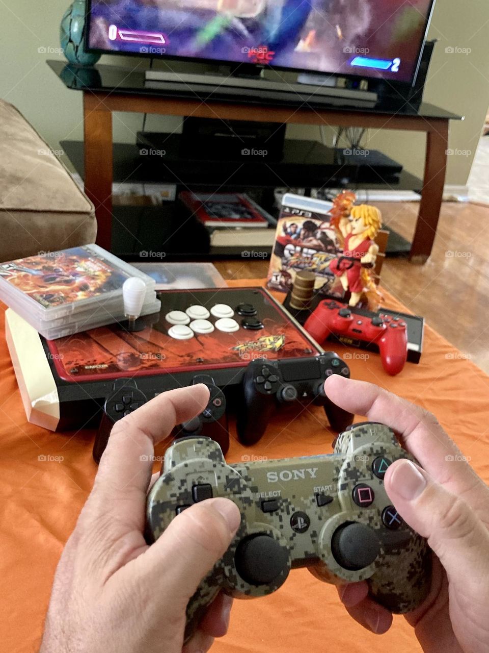 Man playing street fighter video game photography mission 