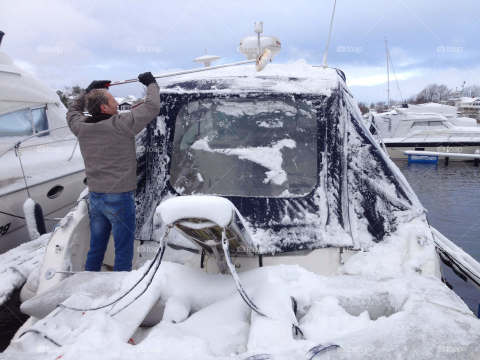 Man removing snow.