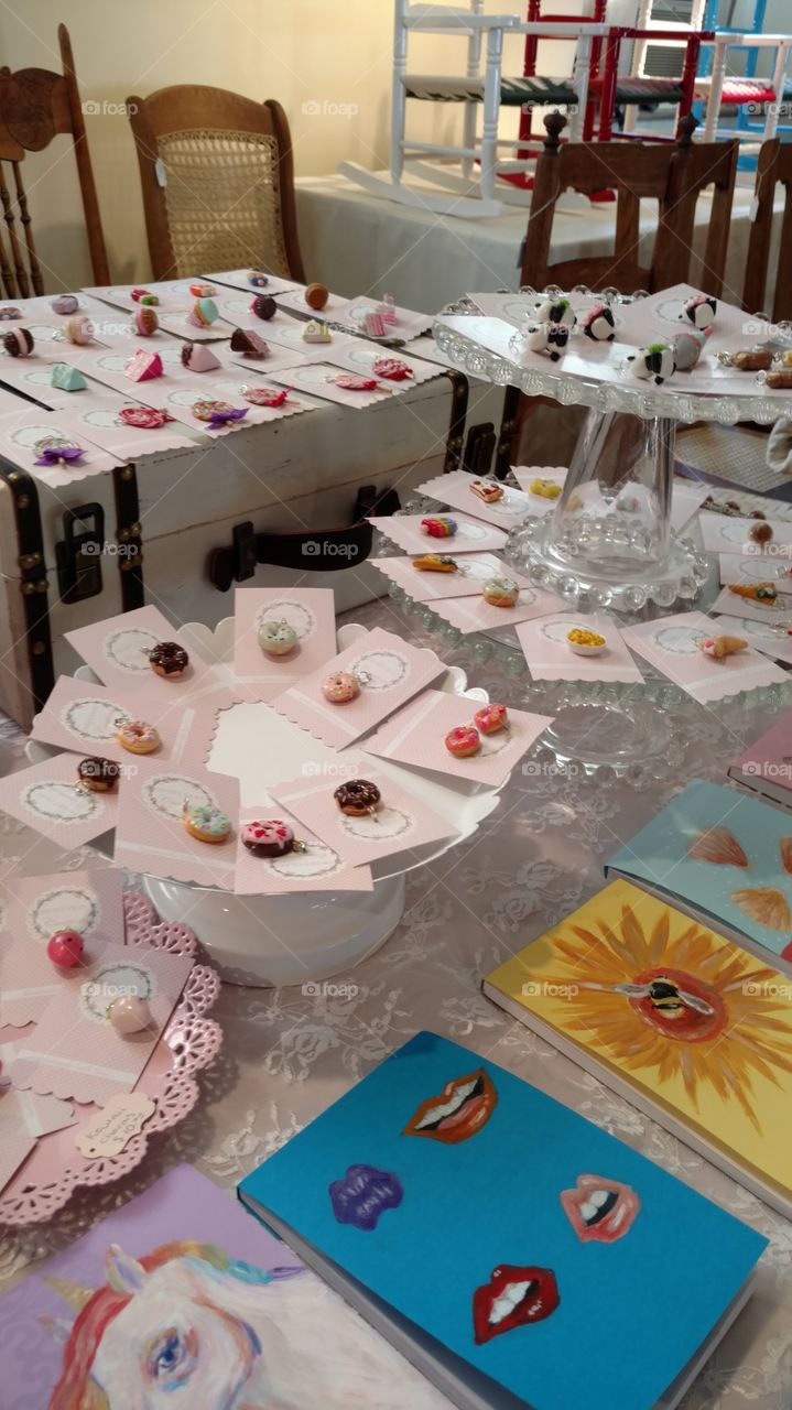 a display of crafts at a homemade market