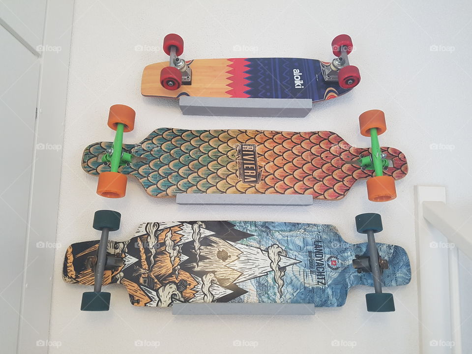 skateboards on the wall