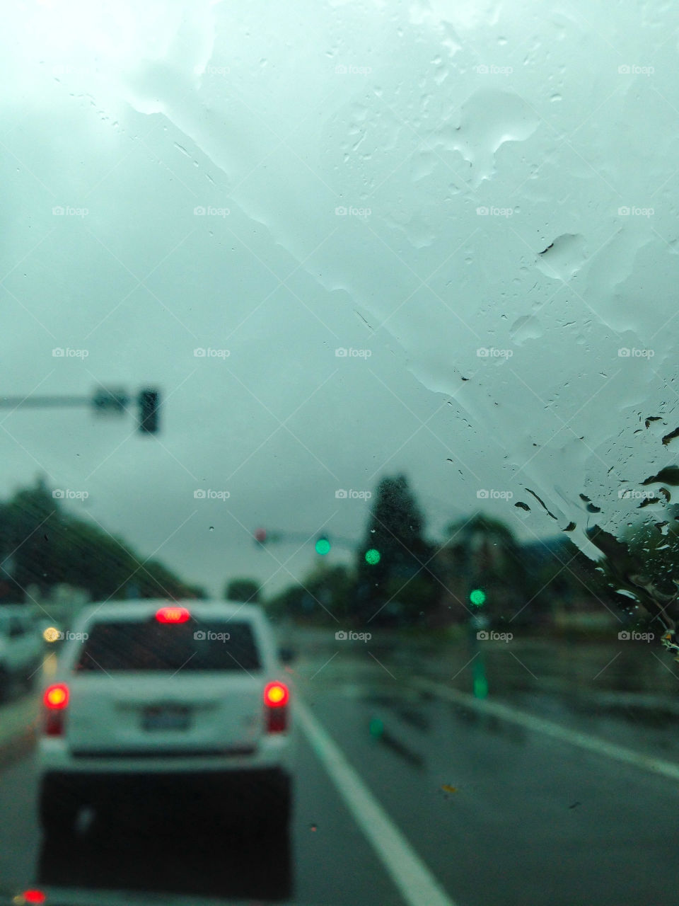 In the Rain. Rain on a car windshield.