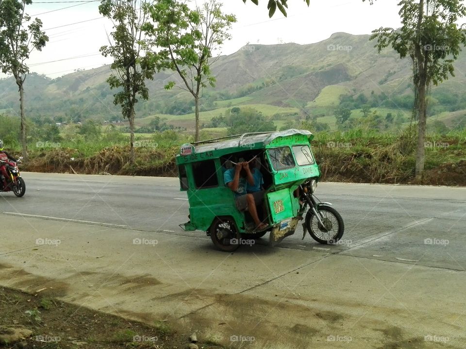 "Pedicab" one of the most popular mode of public transportation in Philippines. A motorcycle with an engine ranging from 125cc to 175cc with a custom side-car.