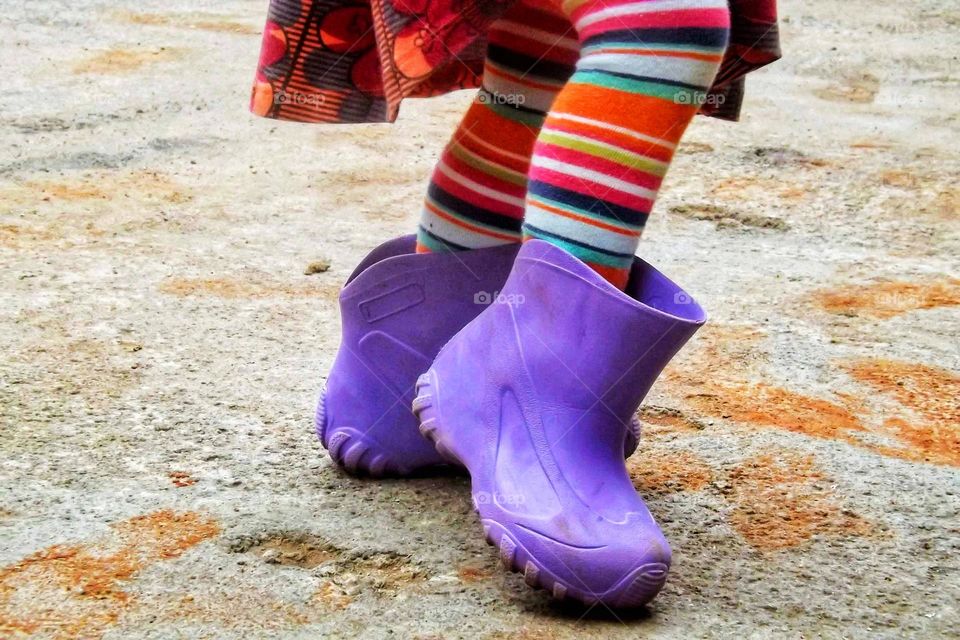 Girl in purple boots