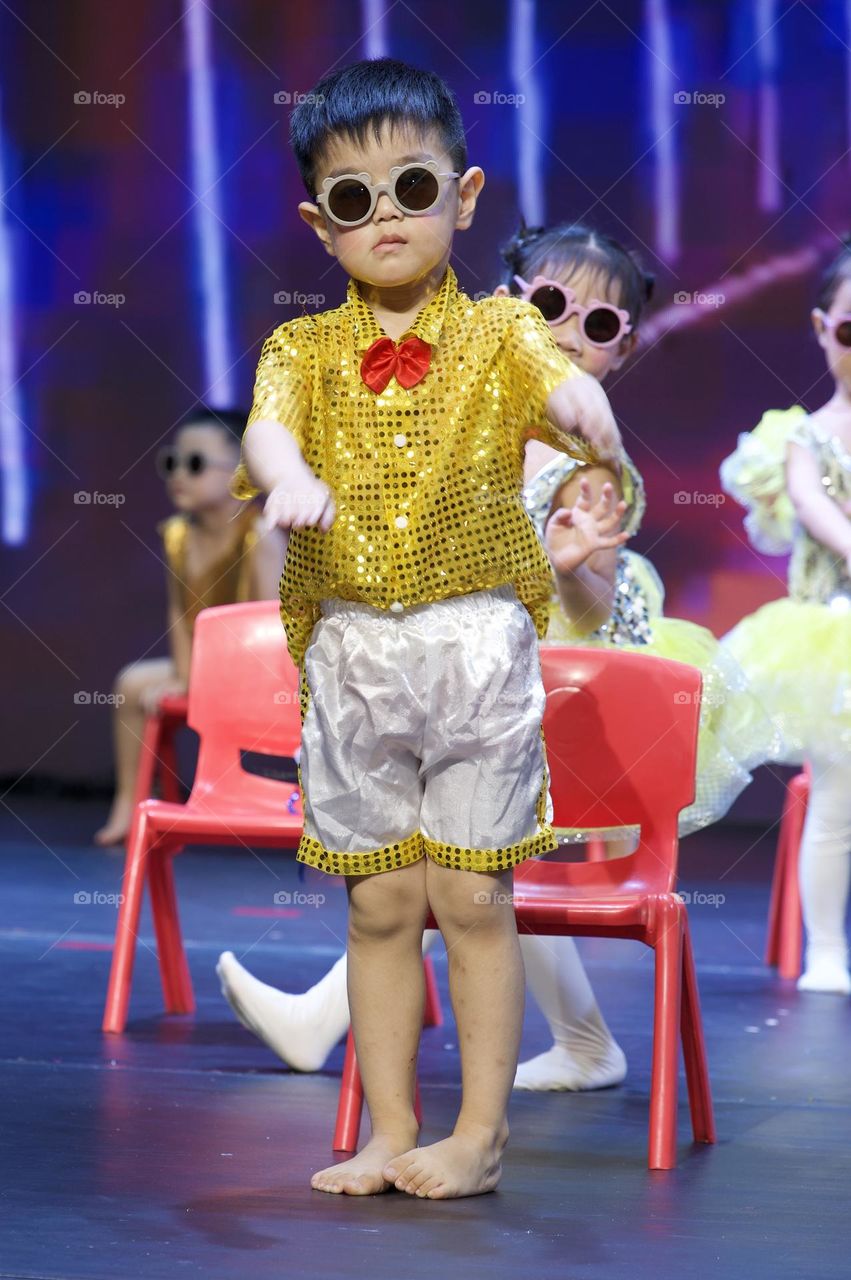 Cute kid Performing on stage