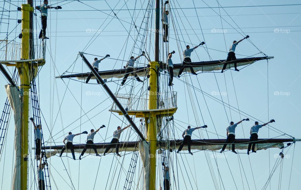 sailing ship crew on masts