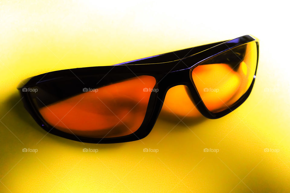 Goggle on Yellow Background