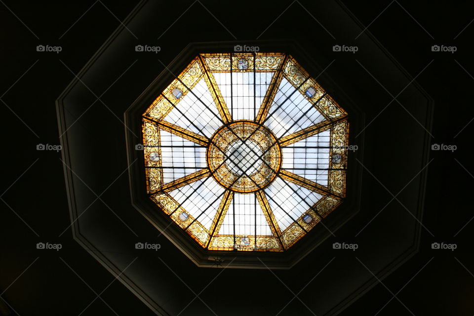 The glass golden ceiling of geometric design 