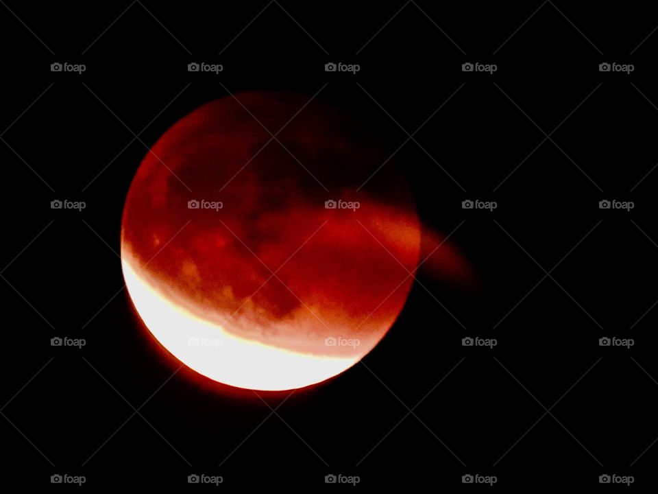 My photos of the Blood Moon, Total lunar eclipse on 15 May 2022 - Lunar eclipses occur when Earth aligns between the sun and the moon and casts a shadow across the lunar surface. The weather condition were very cloudy