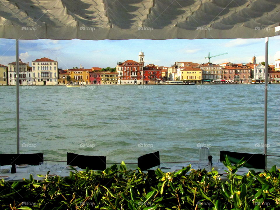 framed city view on the sea under a curtain