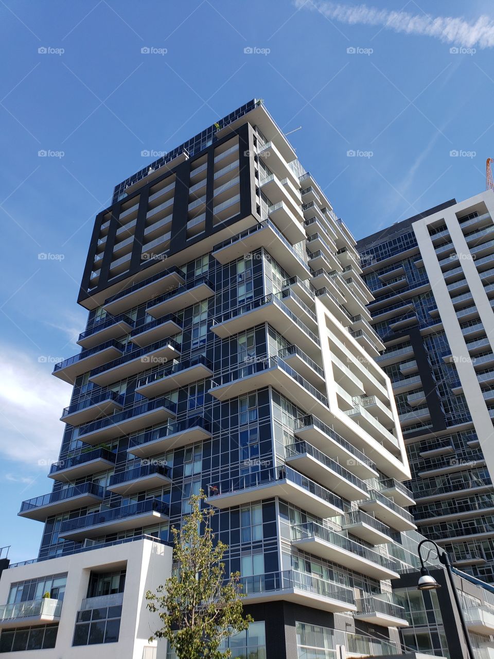 tall condo office building with Sky background