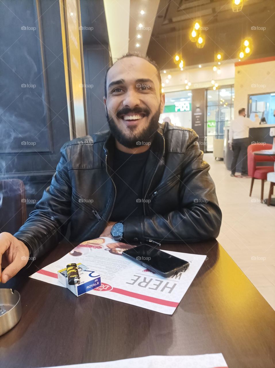 relaxing with a coffee in Senzo Mail Hurghada Egypt