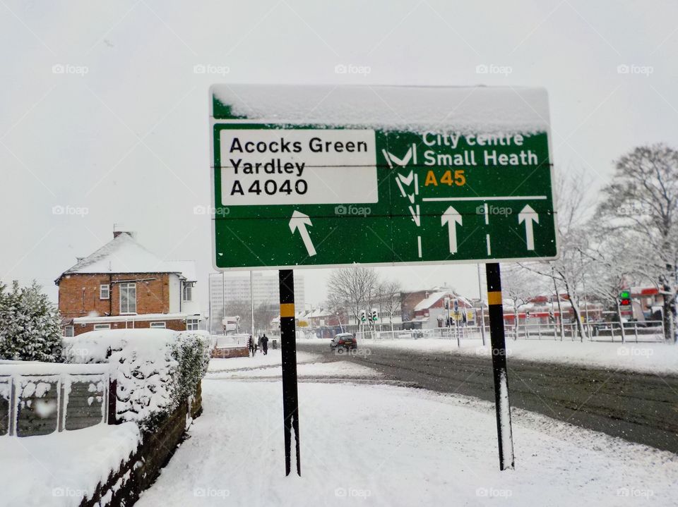 Snowed over signs 