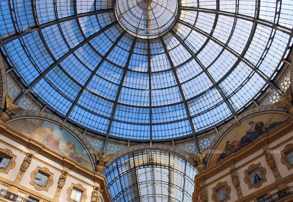 Neo-Renaissance style fasade and roof details of Galeria Vittorio Emanule in Milan. Italy