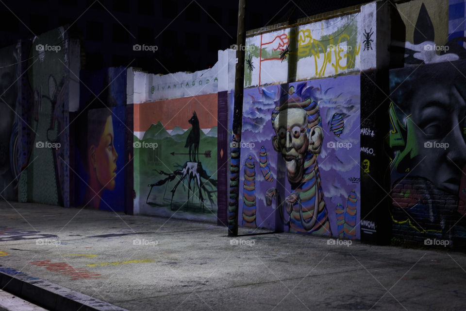 Night lights over a Graffiti Wall