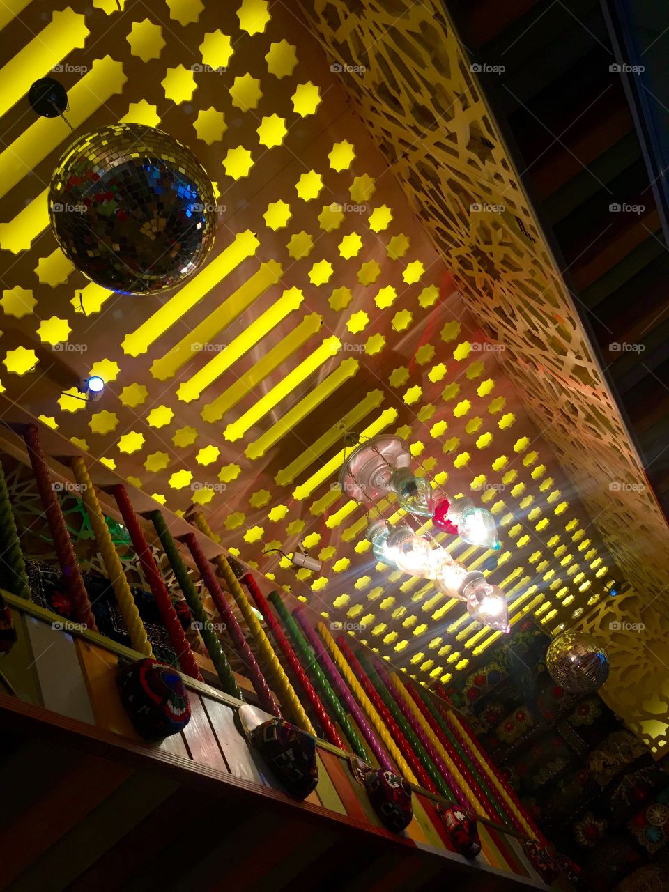 Decorative ceiling with wooden colored element