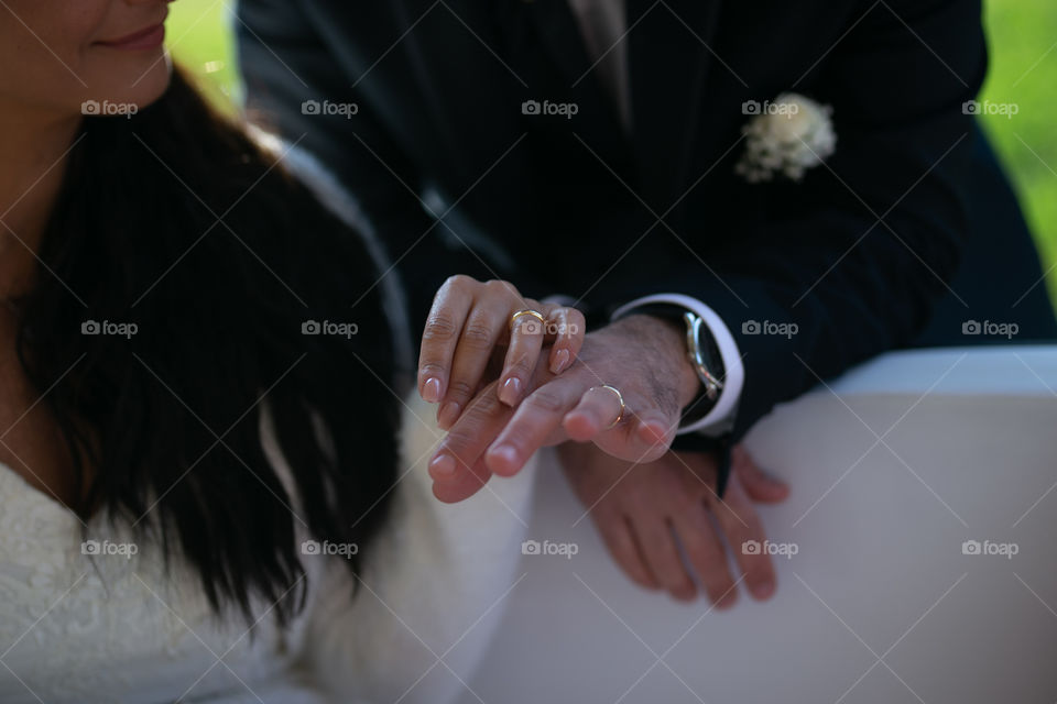 hands with wedding rings