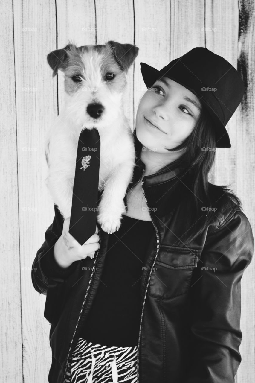 Girl standing with dog