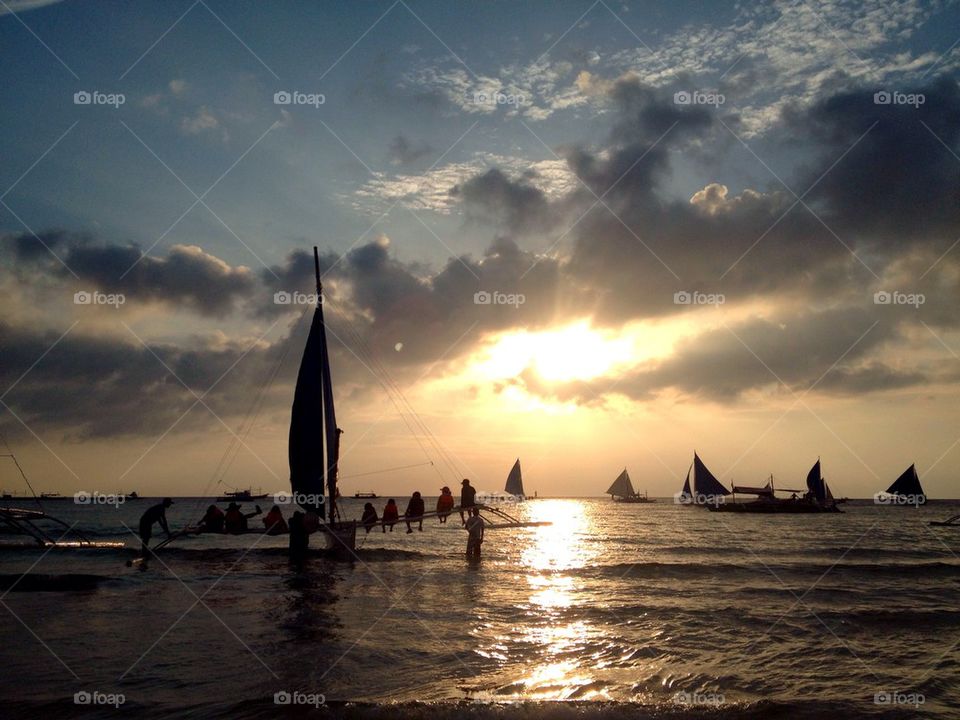Sail boat at sunset