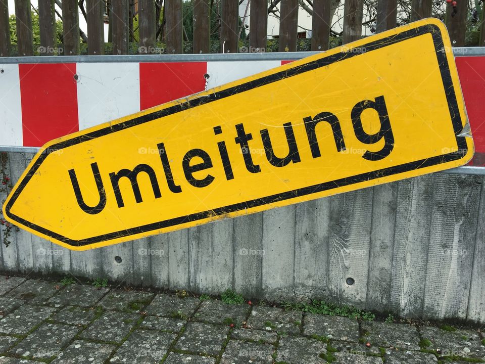 Sign redirection in German "Umleitung" - showing downwards 