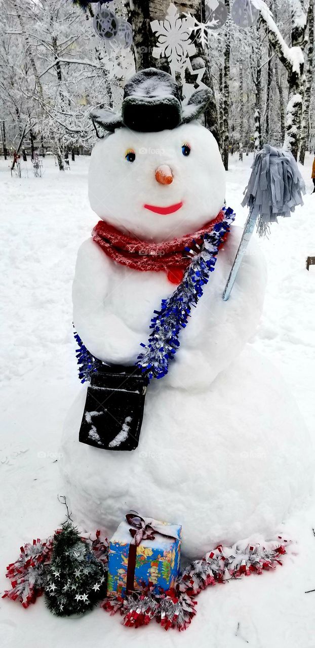 Snowman - the postman is ready for a winter road along with letters and postcards