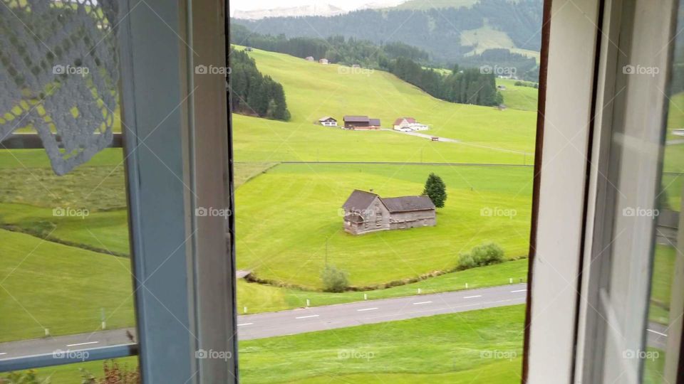 Switzerland house grass mountains