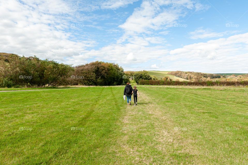 Family summer outdoors activity in fields.