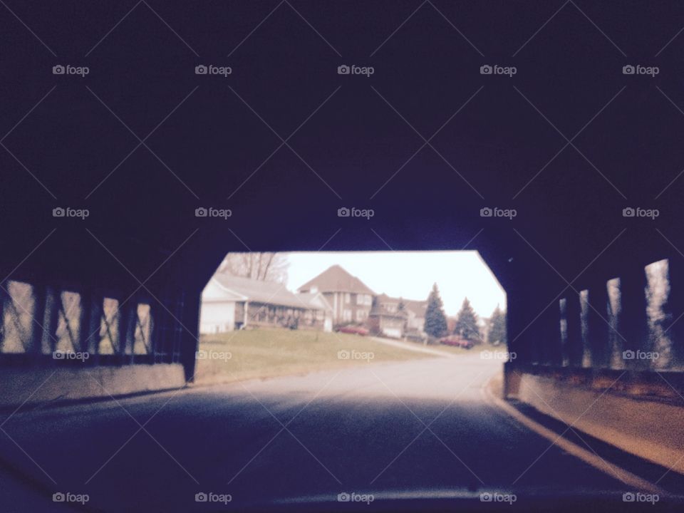 View under a covered bridge