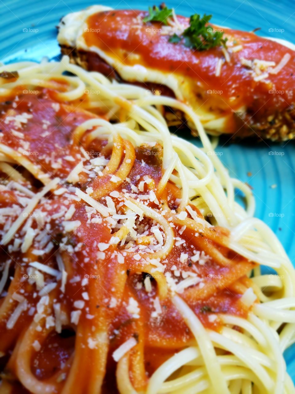 Delicious chicken parmigiana with spaghetti and sauce 