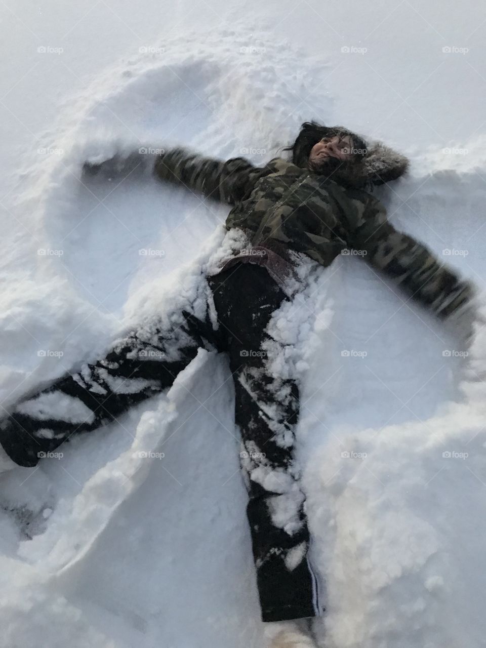 Making a snow angel 