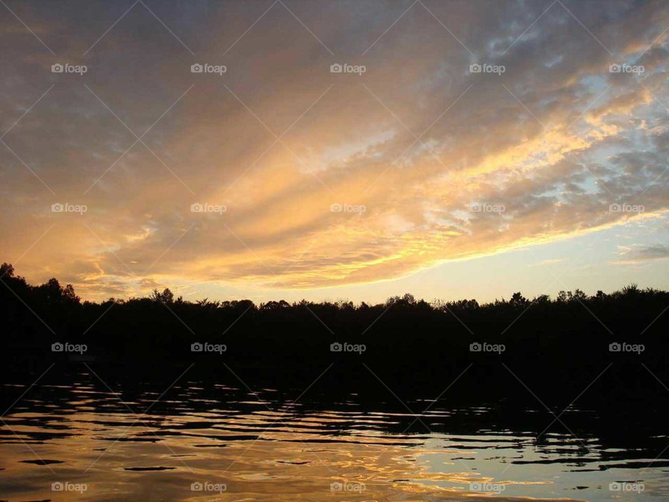 sunset on my kayak on the Lake