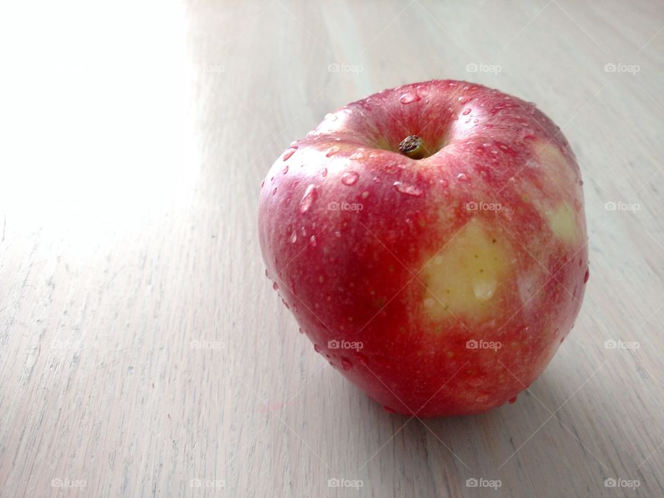 Close up of a red apple.