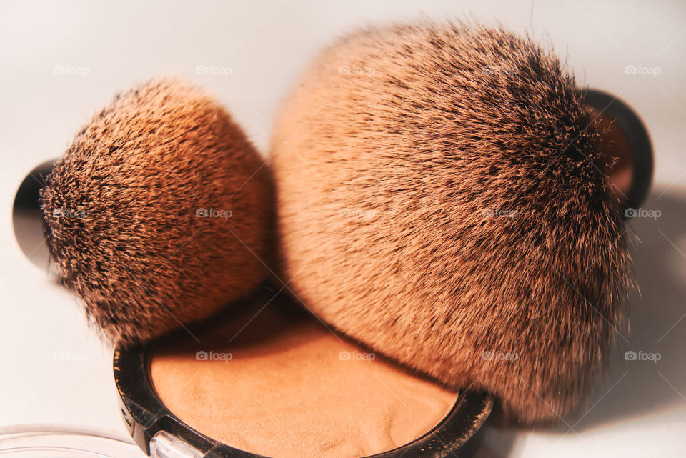 Female products powder and brushes